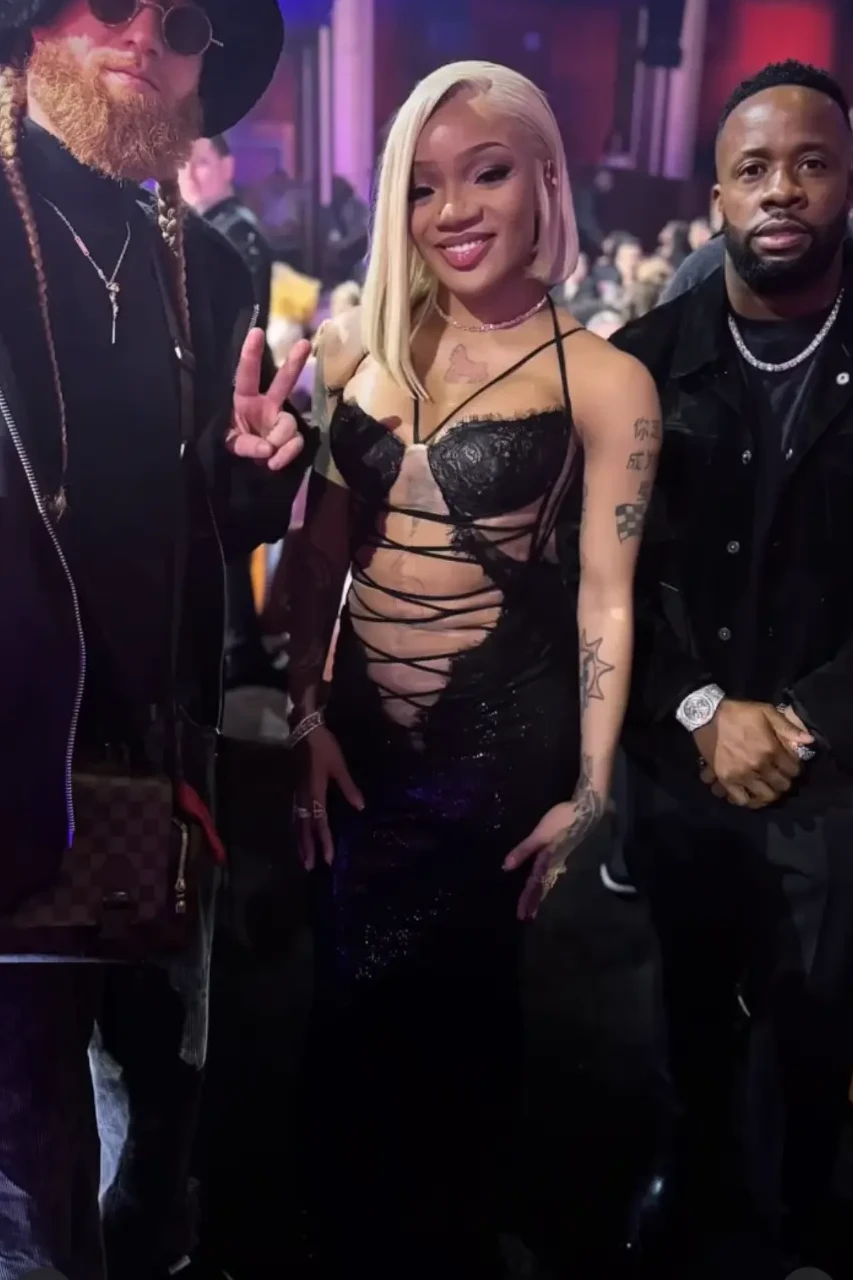 A-OH with GloRilla and Yo Gotti at the iHeartRadio Awards.